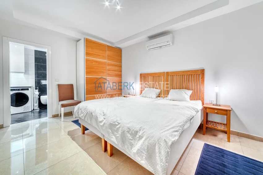 Приобрести Линейна квартира 3+1 под ключ с выходом в сад и видом на море - район Конаклы, Алания 30 