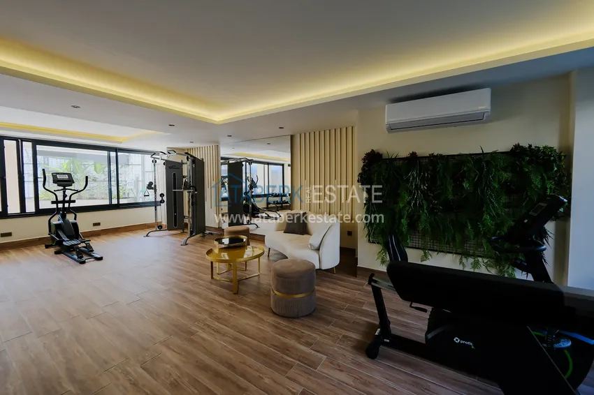 Трёхкомнатная квартира в районе Оба. Недвижимость подходит для краткосрочной аренды 30