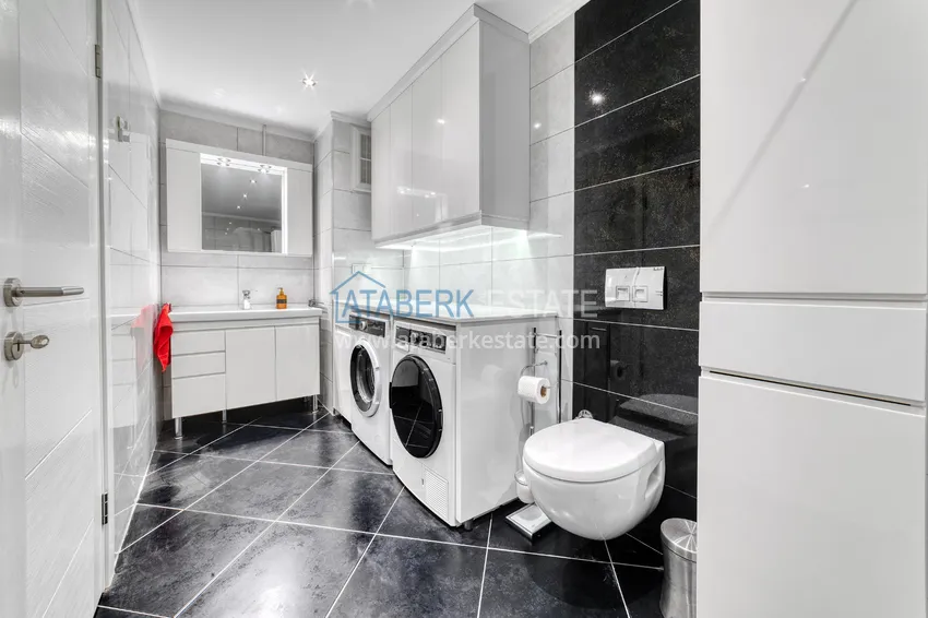 Приобрести Линейна квартира 3+1 под ключ с выходом в сад и видом на море - район Конаклы, Алания 33 