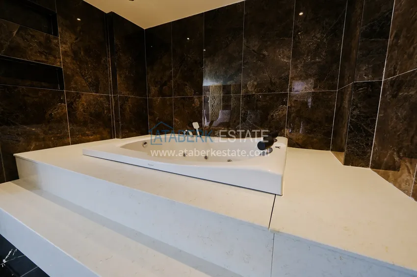 Трёхкомнатная квартира в районе Оба. Недвижимость подходит для краткосрочной аренды 34