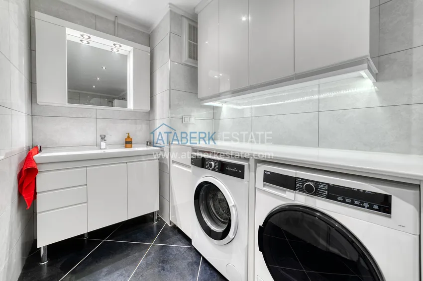 Приобрести Линейна квартира 3+1 под ключ с выходом в сад и видом на море - район Конаклы, Алания 34 