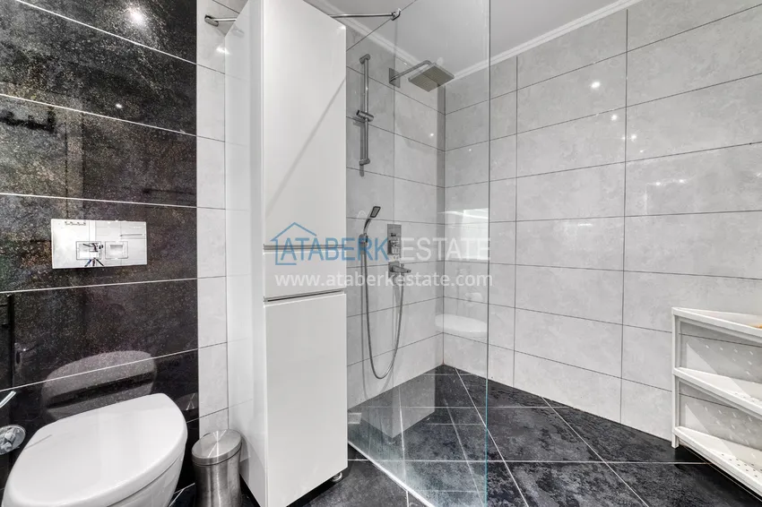 Приобрести Линейна квартира 3+1 под ключ с выходом в сад и видом на море - район Конаклы, Алания 35 