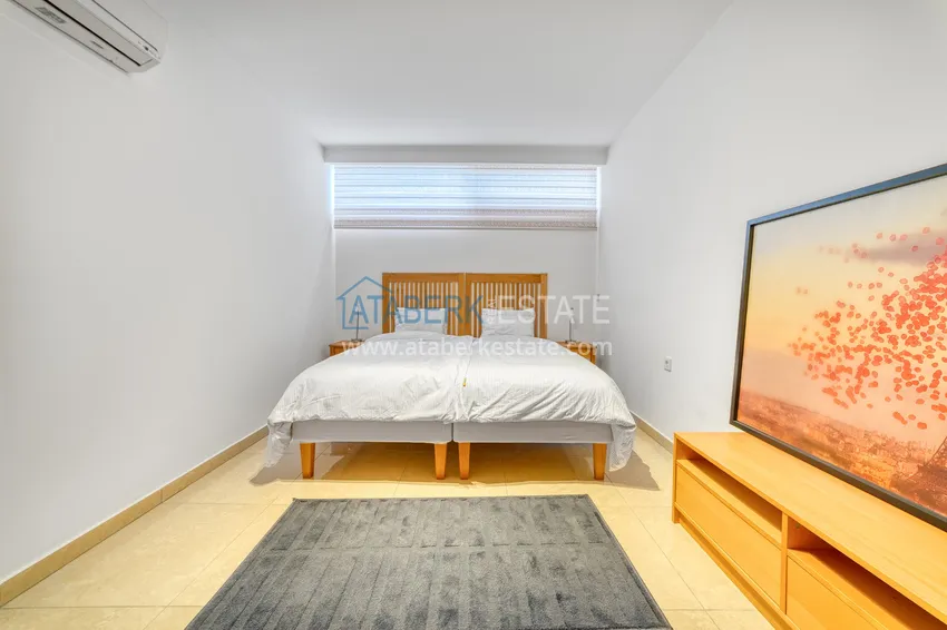 Приобрести Линейна квартира 3+1 под ключ с выходом в сад и видом на море - район Конаклы, Алания 38 