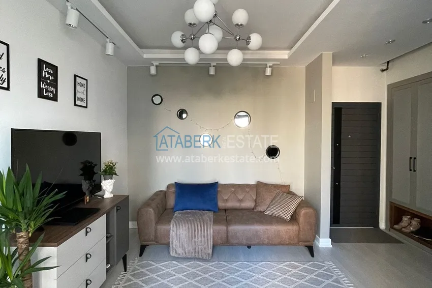 Приобрести Двухкомнатная квартира 80м2 с мебелью и застекленным балконом в Мерсине, Енишехир 3 