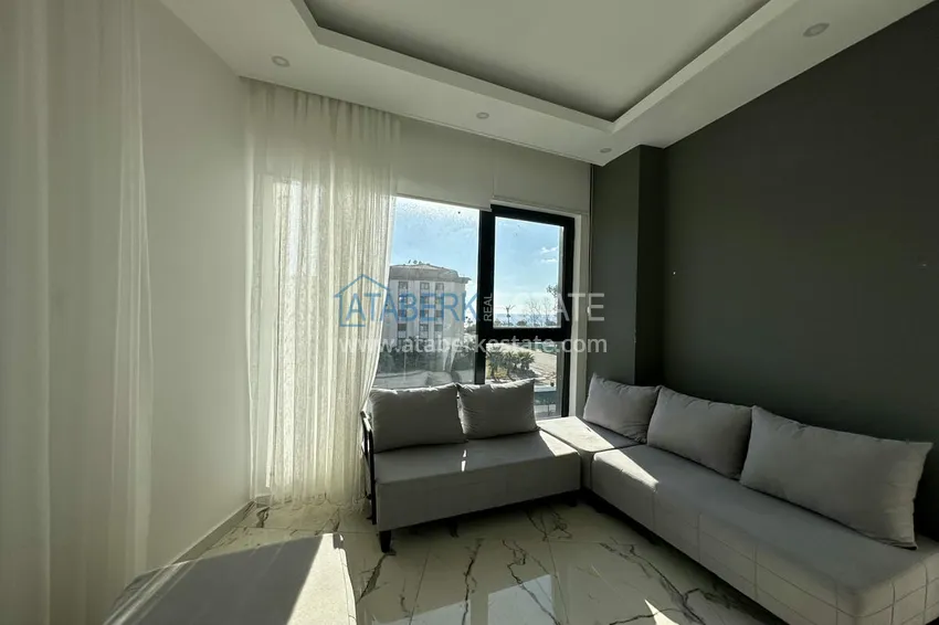 Приобрести Двухкомнатные меблированные квартиры с видом на море, район Кестель, Алания 3