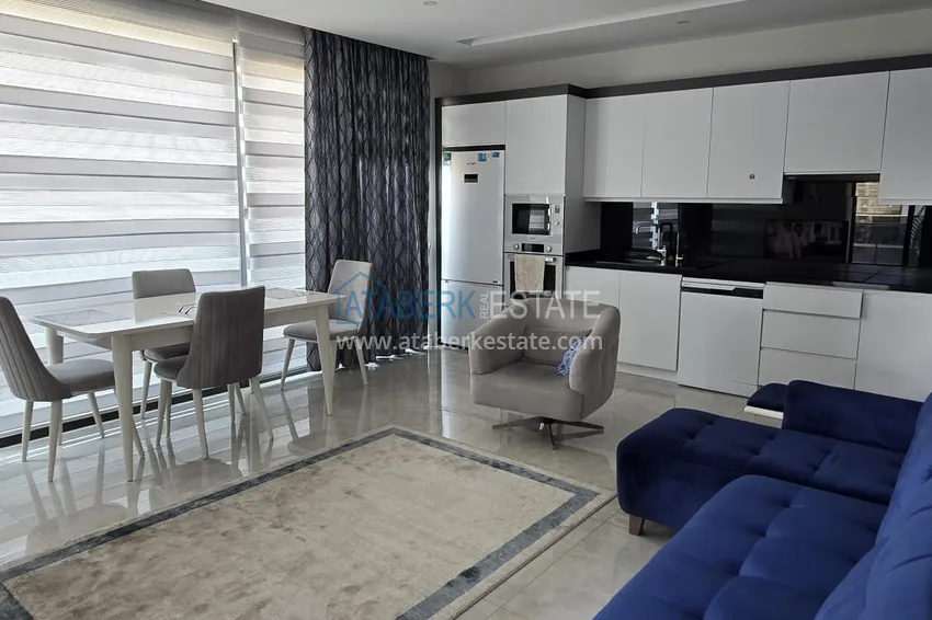 Приобрести Трехкомнатная квартира в комплексе класса люкс, на первой береговой линии – район Махмутлар, Алания 4 