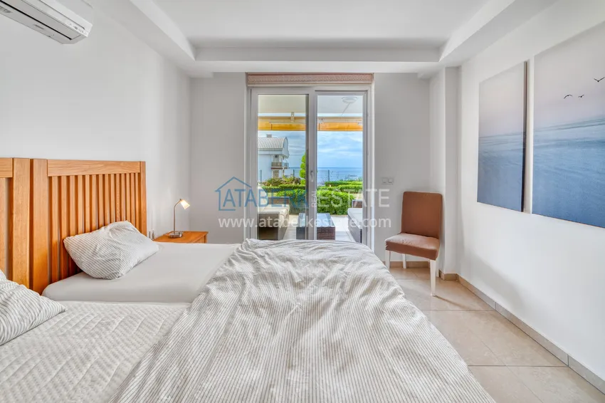 Приобрести Линейна квартира 3+1 под ключ с выходом в сад и видом на море - район Конаклы, Алания 40 