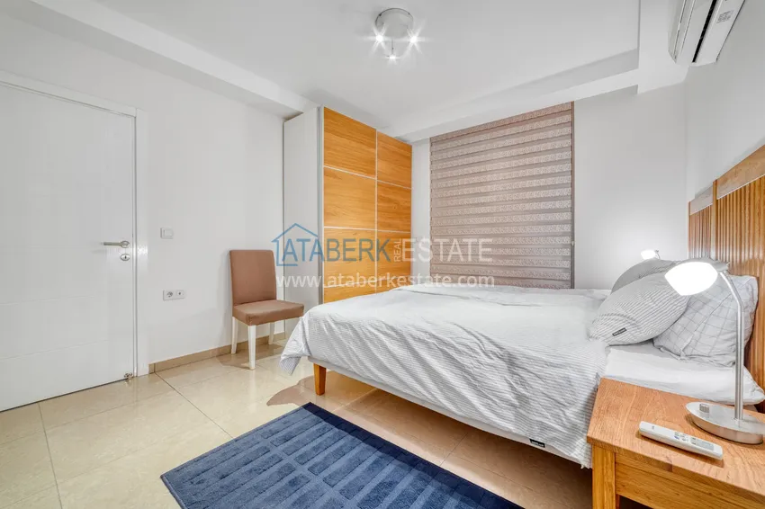 Приобрести Линейна квартира 3+1 под ключ с выходом в сад и видом на море - район Конаклы, Алания 42 