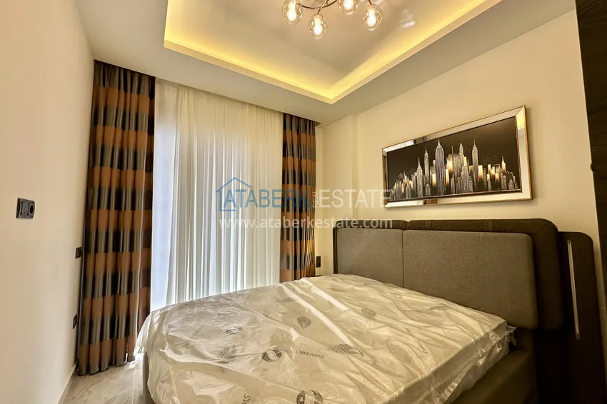 Приобрести Двухкомнатная квартира с мебелью - центр Алании. Подходит для краткосрочной аренды 4 