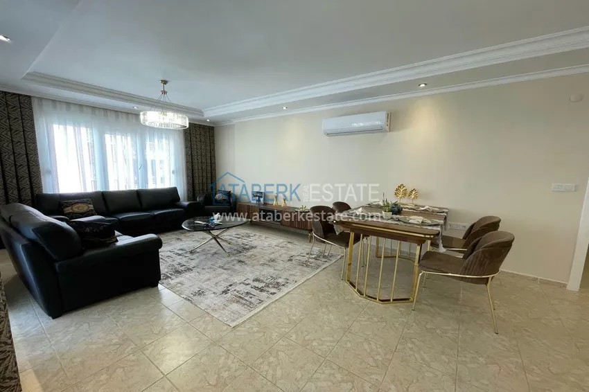 Приобрести Трехкомнатная квартира с новой мебелью и видом на море в районе Тосмур, Алания 4 