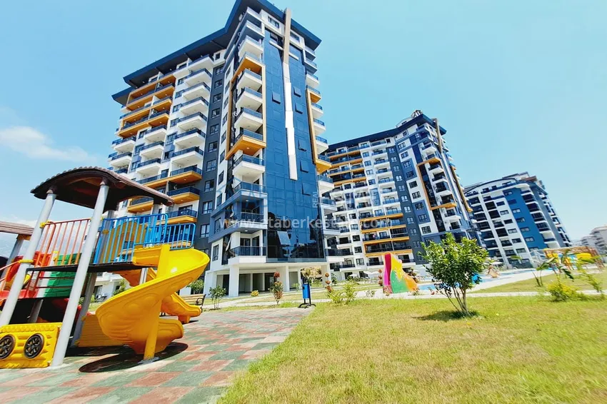 Квартира 1+1 с мебелью и видом на горы. Новостройки Алании, район Махмутлар 4 