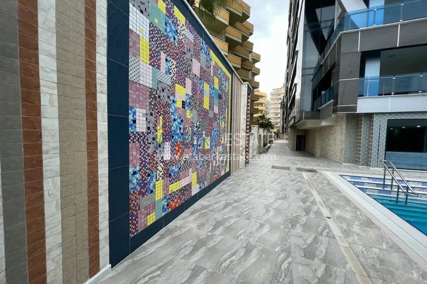 Квартира в Махмутларе с дизайнерским интерьером и прямым видом на море 4 