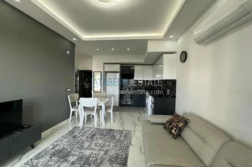 Приобрести Двухкомнатные меблированные квартиры с видом на море, район Кестель, Алания 18