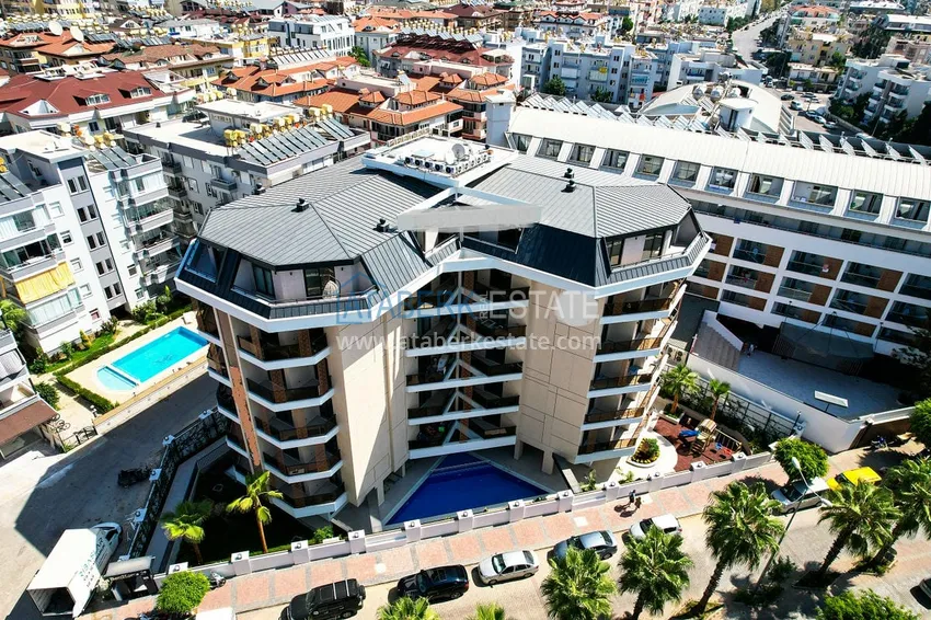 Приобрести Меблированная трехкомнатная квартира в районе Тосмур, Алания 4 