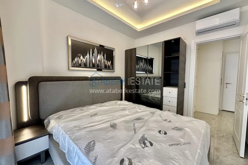 Приобрести Двухкомнатная квартира с мебелью - центр Алании. Подходит для краткосрочной аренды 5 