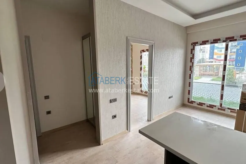 Приобрести Двухкомнатная квартира в микрорайоне Арпачбахшиш, Мерсин 6 