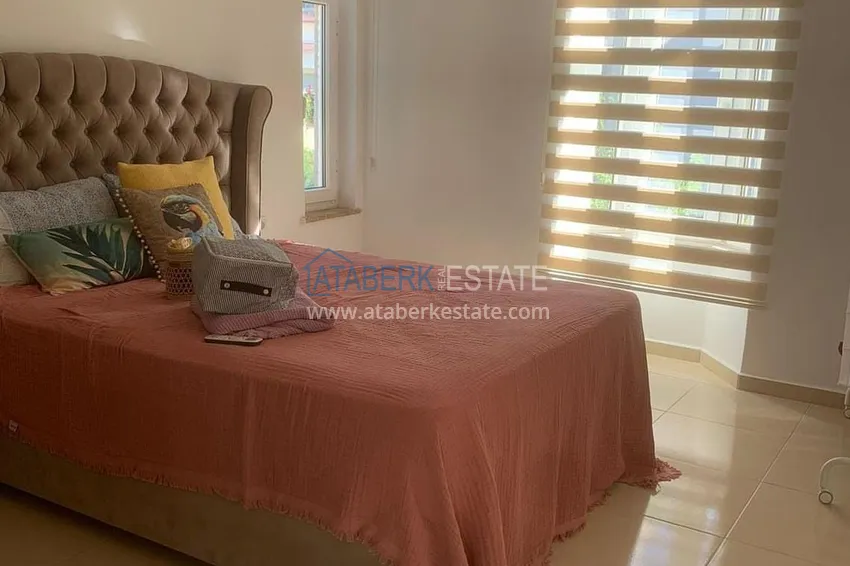 Приобрести Триплекс вилла в коттеджном комплексе в 300 метрах от моря в районе Кестель, Алания 6