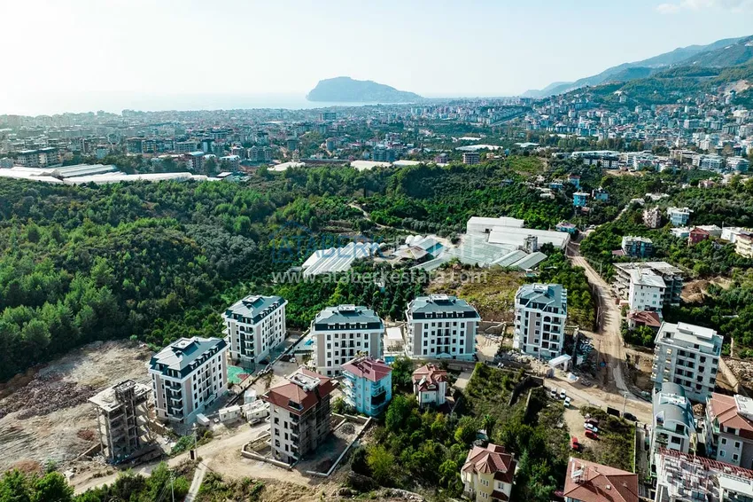 Линейна квартира 3+1 под ключ с выходом в сад и видом на море - район Конаклы, Алания 6 