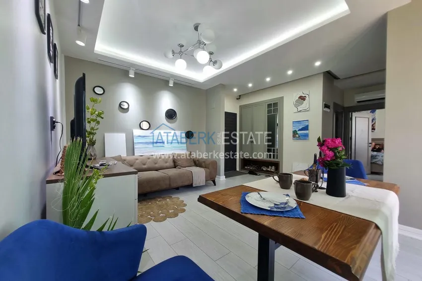 Приобрести Двухкомнатная квартира 80м2 с мебелью и застекленным балконом в Мерсине, Енишехир 6 