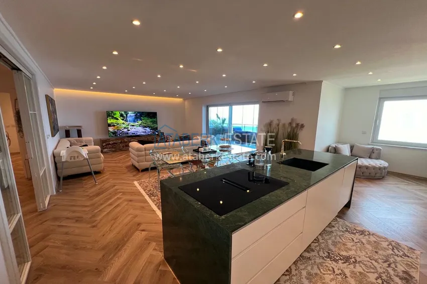 Приобрести Линейная квартира 3+1 с мебелью и застеклённым балконом на первой береговой, район Тосмур – Алания 6 