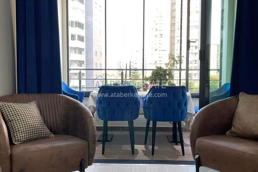 Приобрести Двухкомнатная квартира 80м2 с мебелью и застекленным балконом в Мерсине, Енишехир 7 