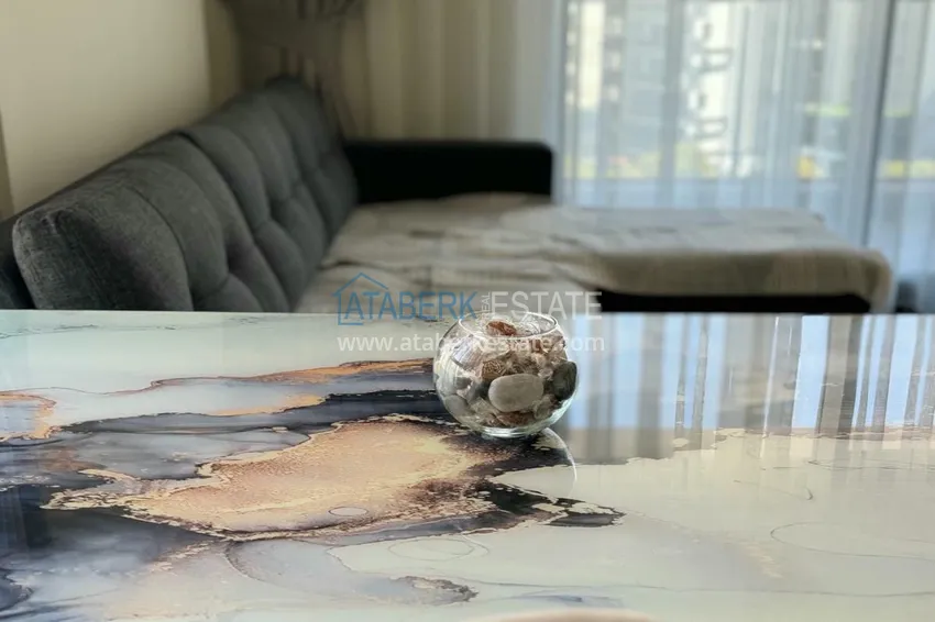 Приобрести Квартира 1+1 с мебелью и видом на горы. Новостройки Алании, район Махмутлар 7 