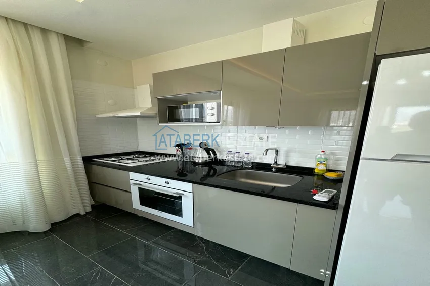 Приобрести Квартира 1+1 с новой мебелью и видом на горы в современном комплексе - район Махмутлар, Алания 8 