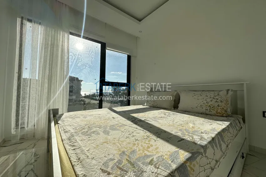 Приобрести Двухкомнатные меблированные квартиры с видом на море, район Кестель, Алания 7