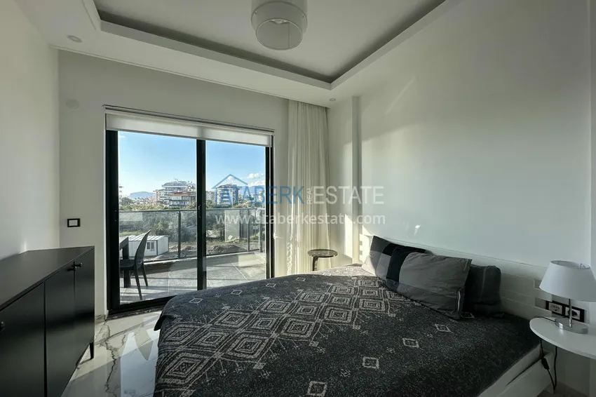 Приобрести Двухкомнатные меблированные квартиры с видом на море, район Кестель, Алания 21