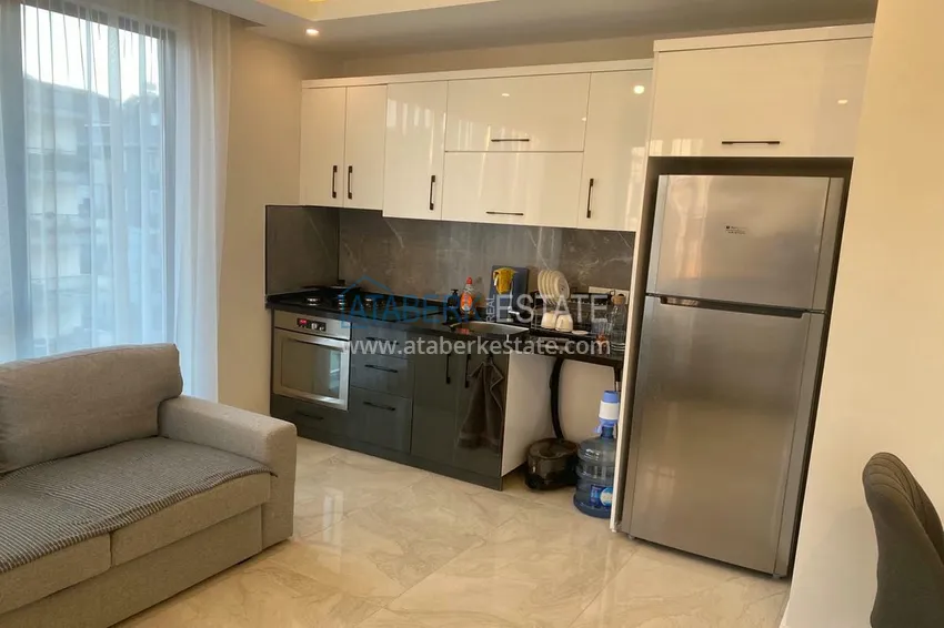 Приобрести Меблированная двухкомнатная квартира от собственника в новостройке - район Оба, Алания 7 