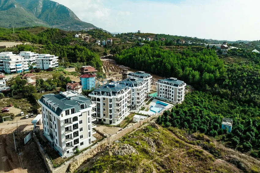 Линейна квартира 3+1 под ключ с выходом в сад и видом на море - район Конаклы, Алания 9 