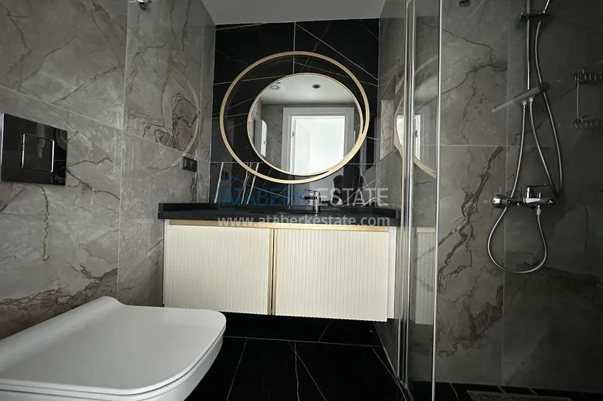 Приобрести Трёхкомнатная квартира в районе Оба. Недвижимость подходит для краткосрочной аренды 8