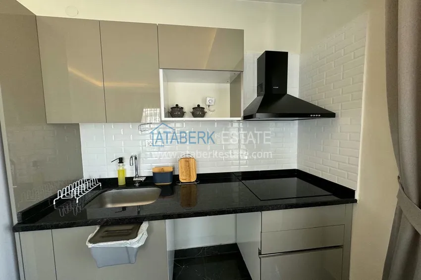 Приобрести Квартира 1+1 с мебелью и видом на горы. Новостройки Алании, район Махмутлар 8 