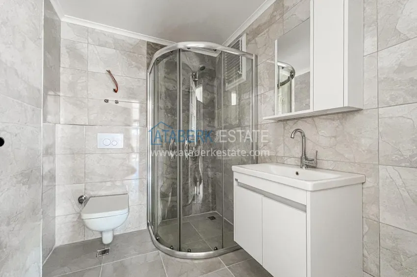 Приобрести Двухкомнатная квартира с чистовой отделкой в новом комплексе - район Махмутлар, Алания 8 