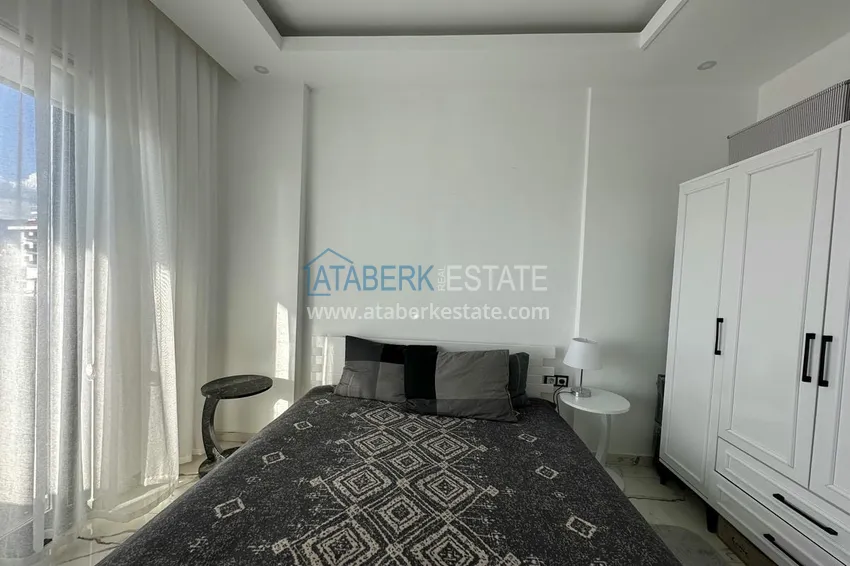 Приобрести Двухкомнатные меблированные квартиры с видом на море, район Кестель, Алания 23