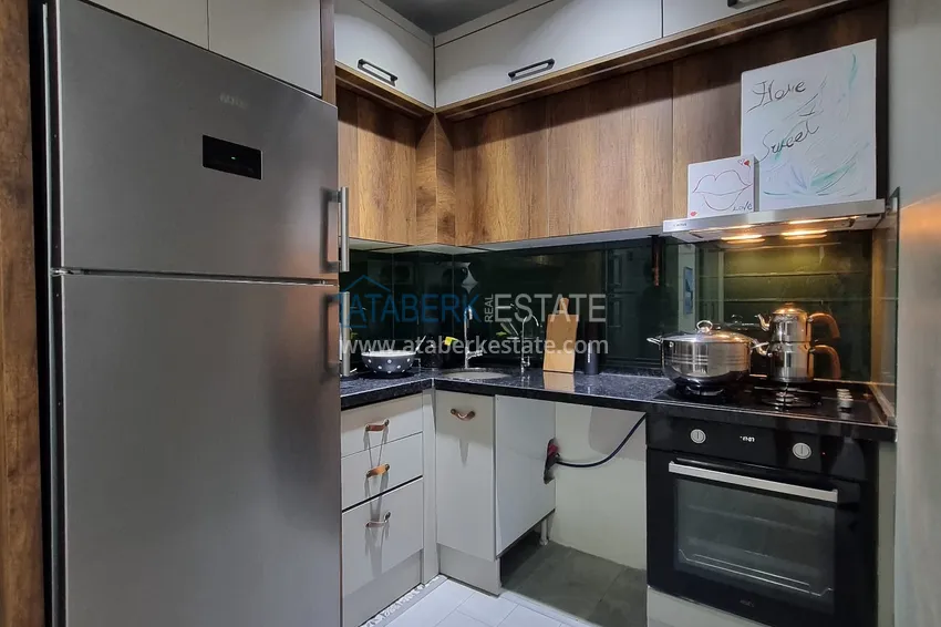 Приобрести Двухкомнатная квартира 80м2 с мебелью и застекленным балконом в Мерсине, Енишехир 9 