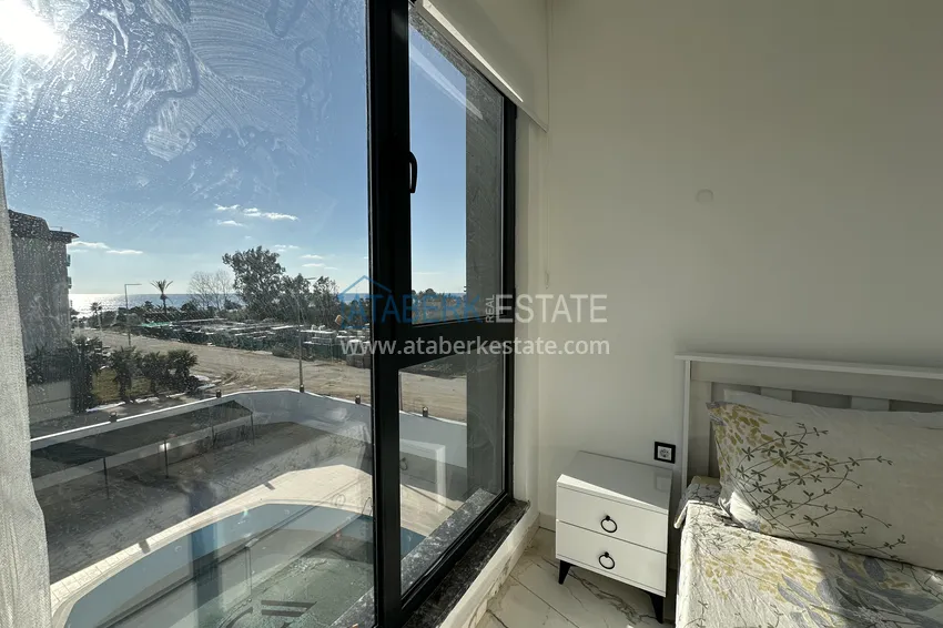 Приобрести Двухкомнатные меблированные квартиры с видом на море, район Кестель, Алания 9