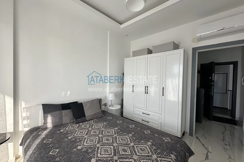 Приобрести Двухкомнатные меблированные квартиры с видом на море, район Кестель, Алания 24