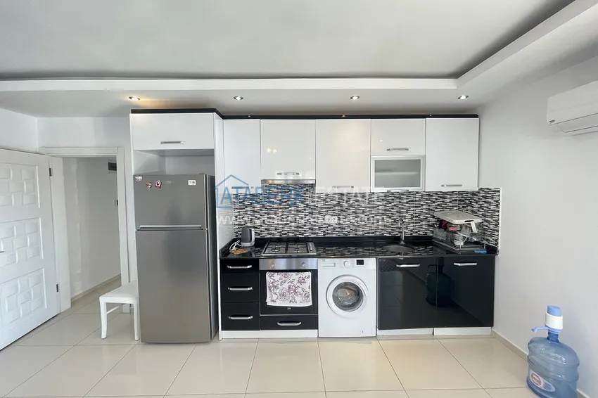 Приобрести Меблированная трехкомнатная квартира в районе Тосмур, Алания 9 