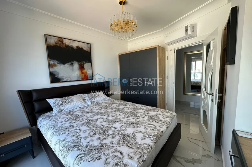 Приобрести Квартира в Махмутларе с дизайнерским интерьером и прямым видом на море 10 