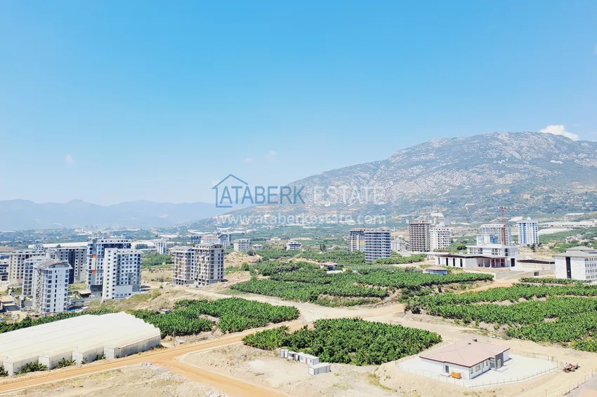 Приобрести Срочная продажа! Роскошный двухуровневый пентхаус с видовыми характеристиками в Алании, район Махмутлар 16