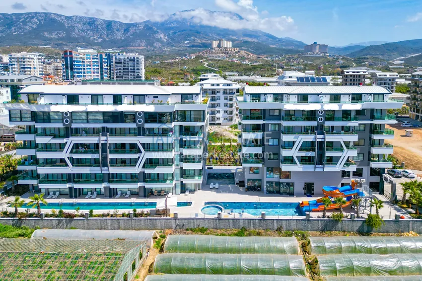 Квартира 2+1 в новом жилом комплексе с частным пляжем. Район Каргыджак, Алания 2 