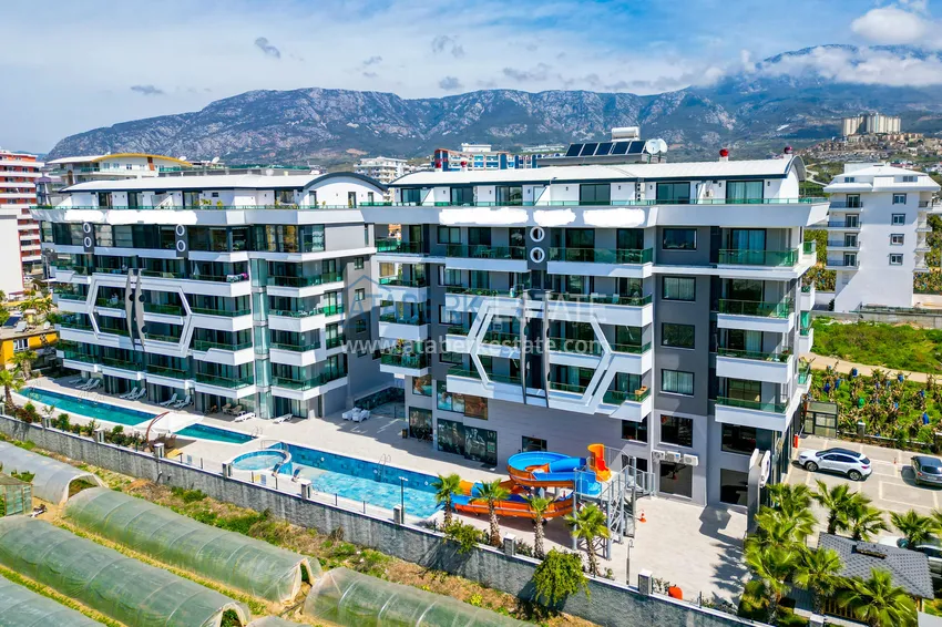 Квартира 2+1 в новом жилом комплексе с частным пляжем. Район Каргыджак, Алания 4 