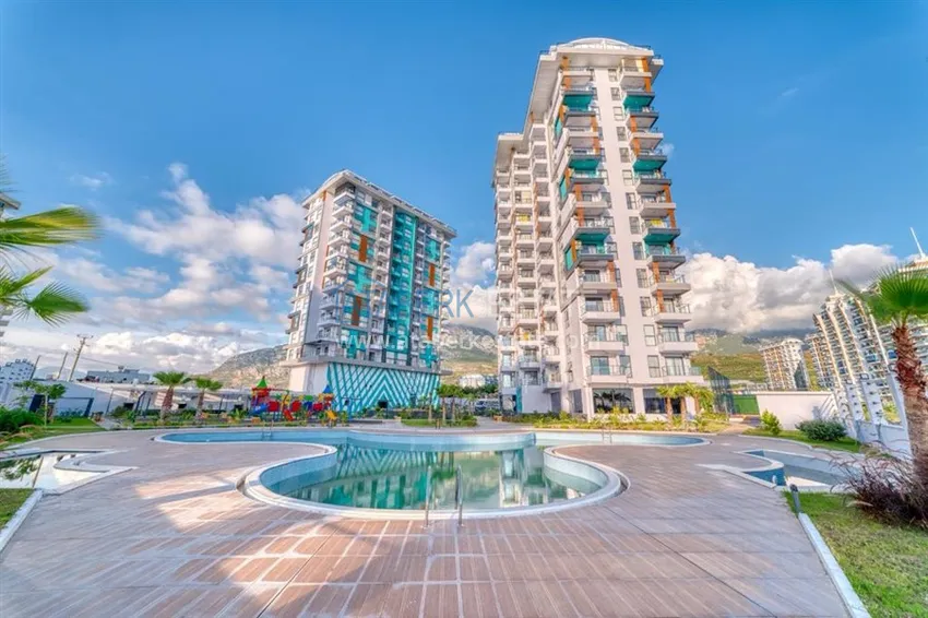 Трехкомнатная квартира в комплексе сегмента комфорт - Махмутлар, Алания 1