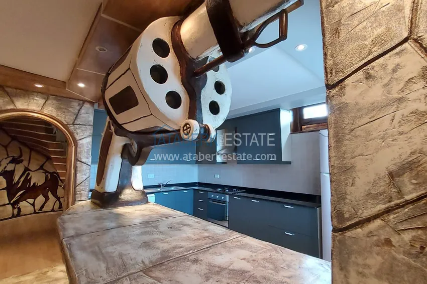 Приобрести Двухэтажная смежная вилла с панорамным видом в районе Бекташ, Алания. Недвижимость подходит для гражданства 7 