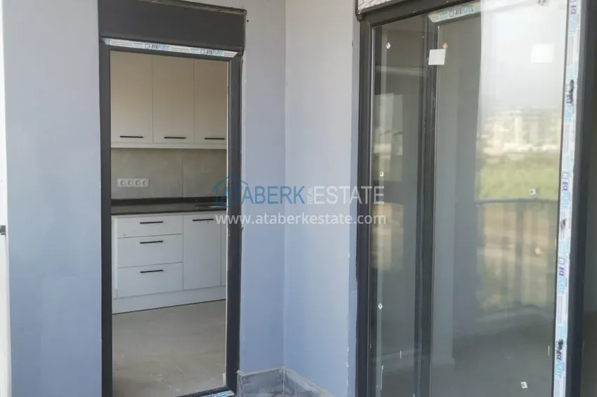 Приобрести Квартира 2+1 с отдельной кухней и видом на горы. Район Демирташ, Алания 10 