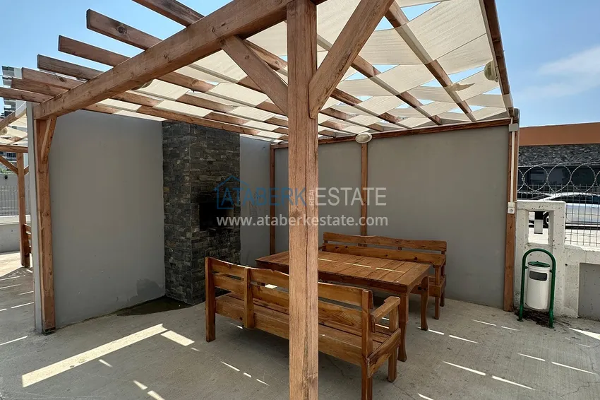 Двухкомнатная квартира в Мерсине, район Арпачбахшиш в 300 метрах от моря 10 