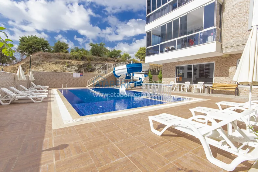 Трехкомнатная квартира под ключ в Махмутларе, с видом на горы и застекленным балконом 10 