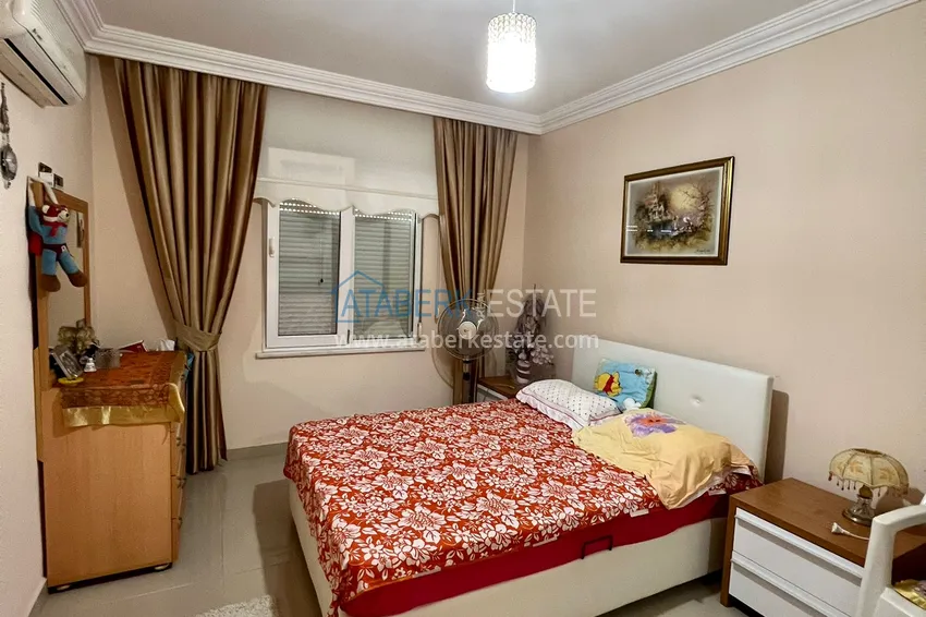 Приобрести Трехкомнатная квартира в Махмутларе с мебелью в комплексе на первой береговой линии 8 