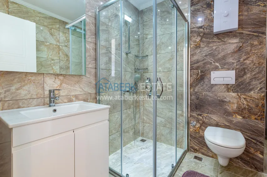 Приобрести Трехкомнатная квартира под ключ в Махмутларе, с видом на горы и застекленным балконом 11 